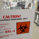 A 2011 file photo showing a warning sign on a door at the Fort Detrick facility.